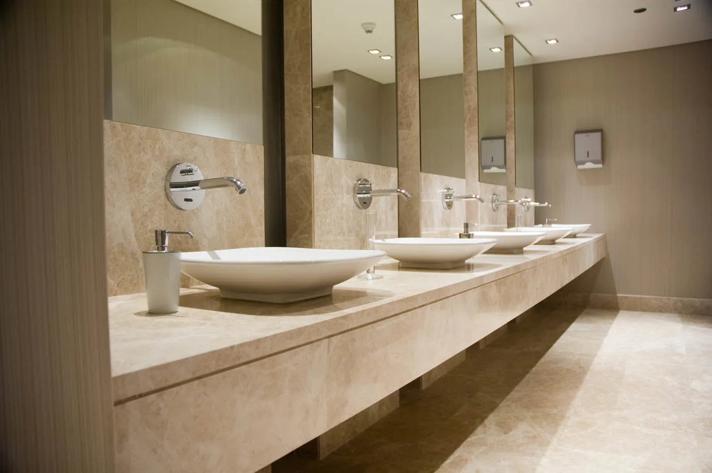 Row of basins in a commercial bathroom fit-out